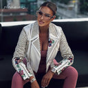 GIACCA BIKER IN VERA PELLE RICAMATA IN BIANCO
